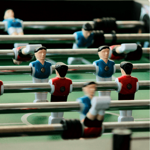 Challenge your brood to a game of table football in the living room