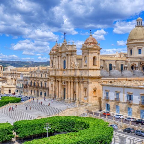Visit St. Nicholas Cathedral in Noto's town centre, en eight-minute walk away
