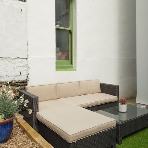 Relax in the suntrap garden after a day of beach activities