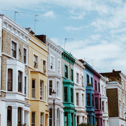 Shop for antiques along colourful Portobello Road, just a one-minute walk away