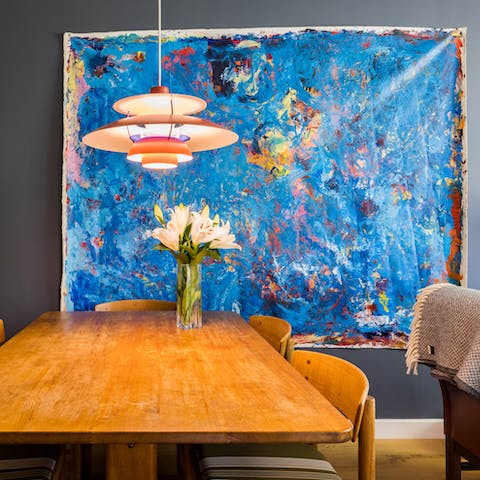 Admire the artistic touches and vibrant artworks throughout this home