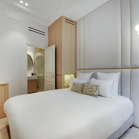 Drift off into a well-earned sleep in the serene bedroom