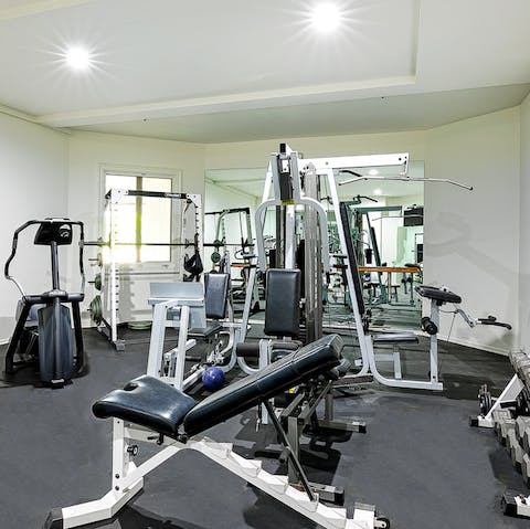 Keep up the hard work in the fully-equipped home gym