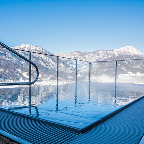 Warm up in the heated pool that stares into the mountains 