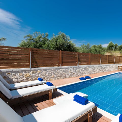 Soak up the Greek sun from in or beside the private pool