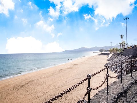 Stroll down the street for two minutes and straight onto Playa Grande's sandy beach