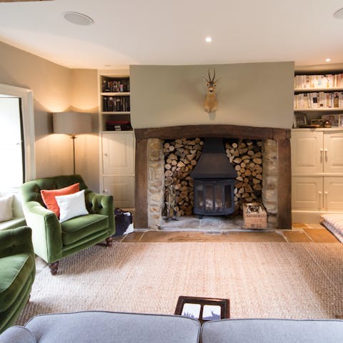 Spend cosy evenings curled on one of the plush sofas, reading your book beside the fire
