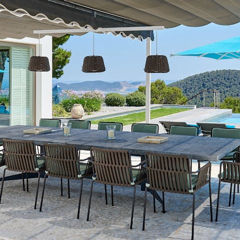Gather up the troops for a family style feast around the outdoor dining table