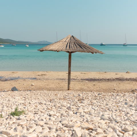Look forward to whiling away the hours on Agia Irini Beach, a seven-minute drive away