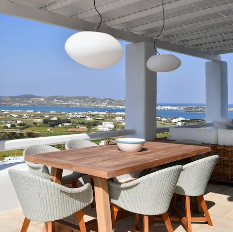 Set the table ready for a Greek-inspired lunch accompanied with glorious views