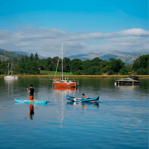 Make a splash – kayak, SUP or sail your way around Lake Windermere, 4 miles from your home