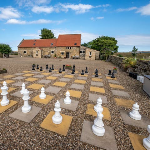 Play a fun game of outdoor chess in the communal courtyard
