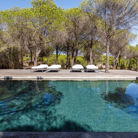 Spend all afternoon relaxing by the communal pool