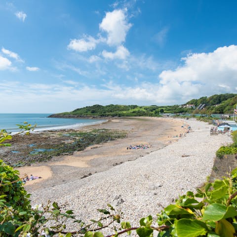 Spend hours on Langland bay with its colourful beach huts