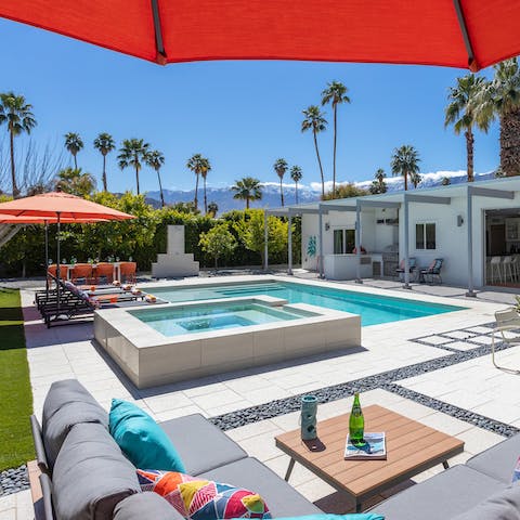 Enjoy some R&R in the yard, which has a private pool and Jacuzzi