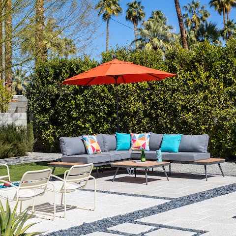Sip your morning coffee on the plush outdoor sofa