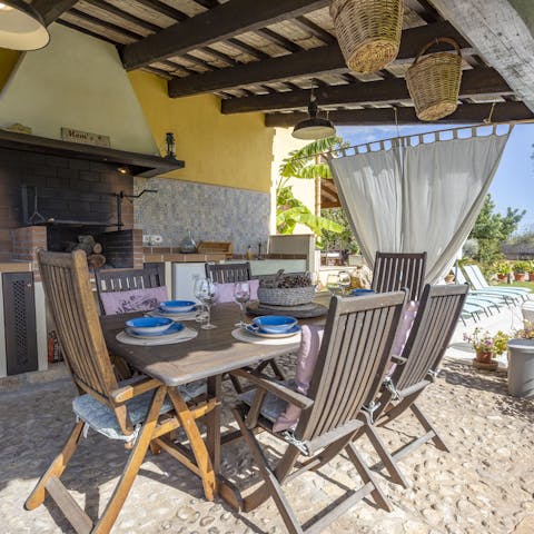 Embrace the warmth and tradition of Mallorca from the outdoor kitchen