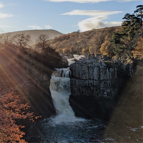Appreciate the power and beauty of the natural world at High Force Waterfall, approximately 15 miles away