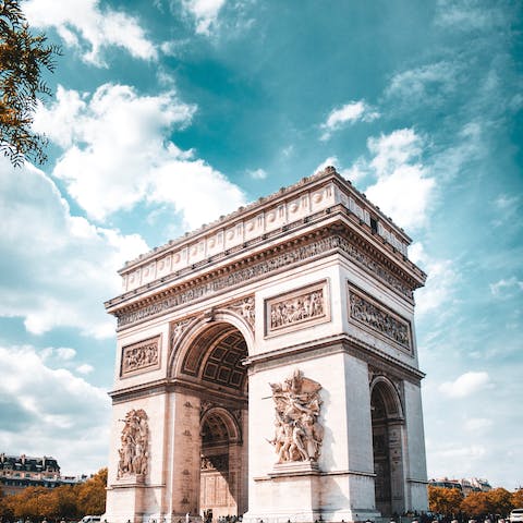 Take some photos of the Arc de Triomphe, under a twenty-minute walk away