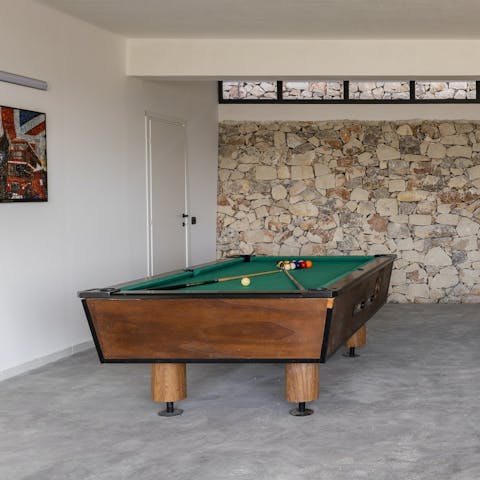 Challenge your guests to a game of pool