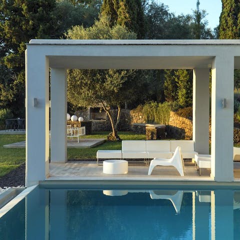 Enjoy a dip in the private pool or relax in the shade of ancient trees