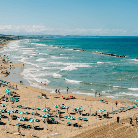 Make your way to Spiaggia di Scianuli for a day in the surf, only minutes away