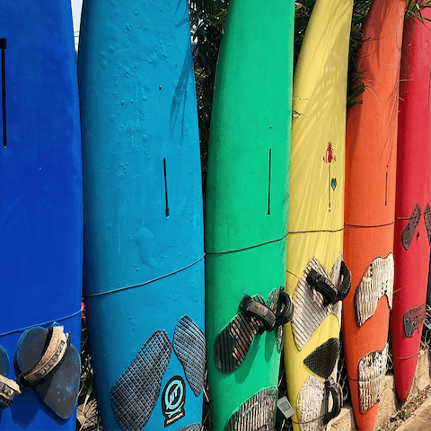 Grab your board and head to the beach to catch some waves