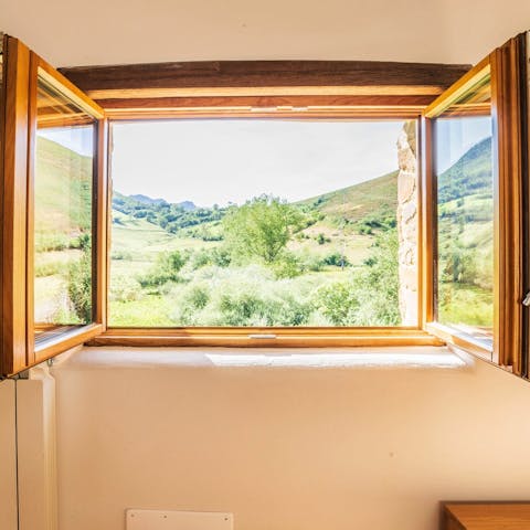 Gaze out at the gorgeously-green views from the bedroom window