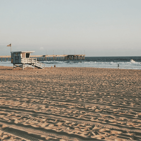 Lounge on the golden sands of Venice Beach, a two-minute walk from your doorstep
