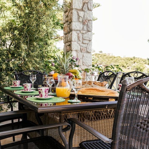 Enjoy a long, leisurely lunch on the terrace overlooking the verdant hills