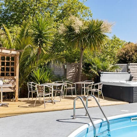 Retreat to the garden for a refreshing dip in the pool followed by a spot of al fresco dining