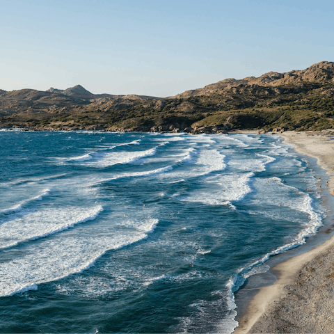 Explore the idyllic island of Corsica and its hiking trails, pristine beaches, watersports, and glitzy towns