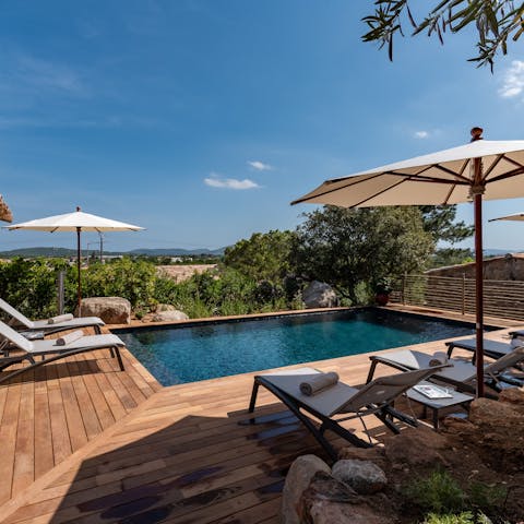Spend lazy days beside the glittering pool, soaking up the sun and taking the occasional dip