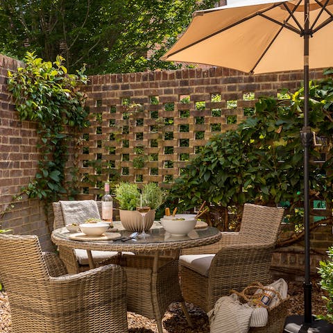 Enjoy the complimentary gin and tonic or bottle of wine in the courtyard garden