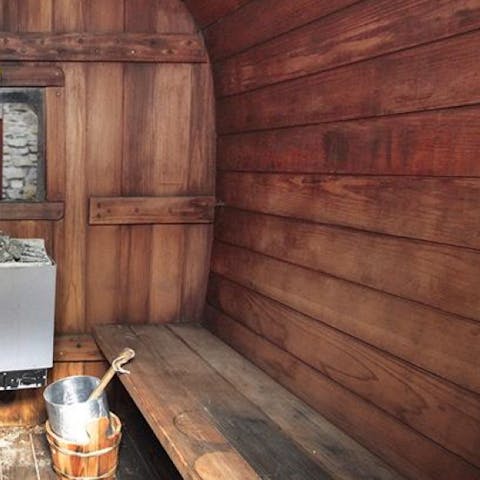 Rejuvenate in the cedar barrel sauna and outside shower after beach days