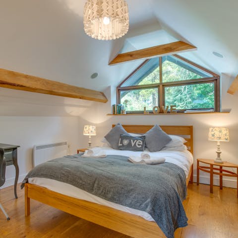 Rise and shine in the lofty, light-filled bedroom