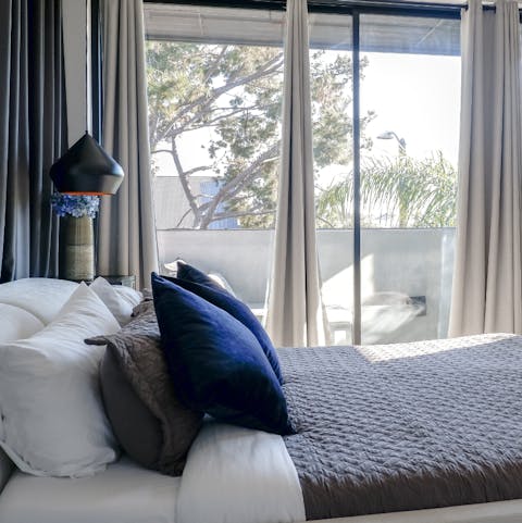 Get some sunlight on your face as soon as you wake up on the master bedroom's balcony