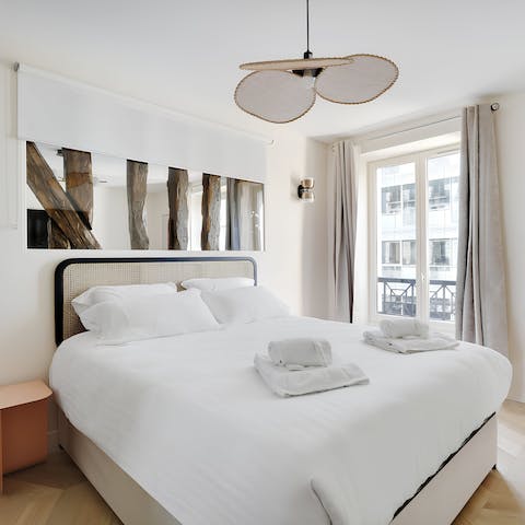 Enjoy a restful night's sleep in the minimalist bedroom