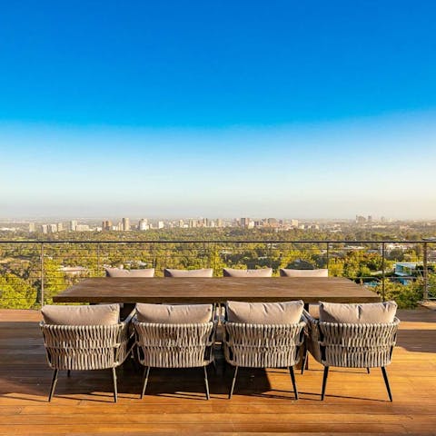 Dine alfresco with skyline panoramas as your backdrop