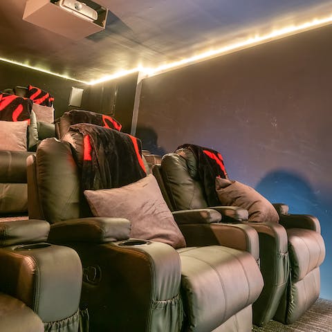 Cosy up in front of a Hollywood movie in the home cinema 