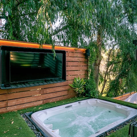 Unwind amidst nature from the jacuzzi hot tub 