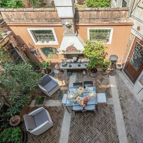 Step into the pretty courtyard garden that feels as though it's from another era