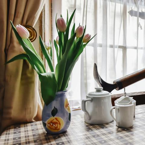 Eat breakfast by the large window overlooking the street