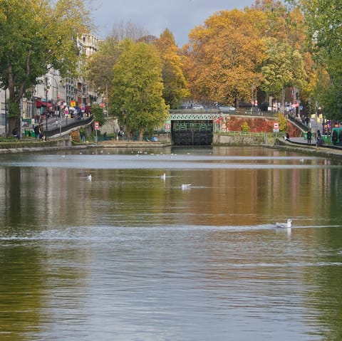 Go for a stroll along the tree-lined Canal Saint-Martin, a stone's throw from home