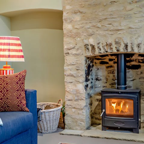 Cosy up in front of the sitting room's fire