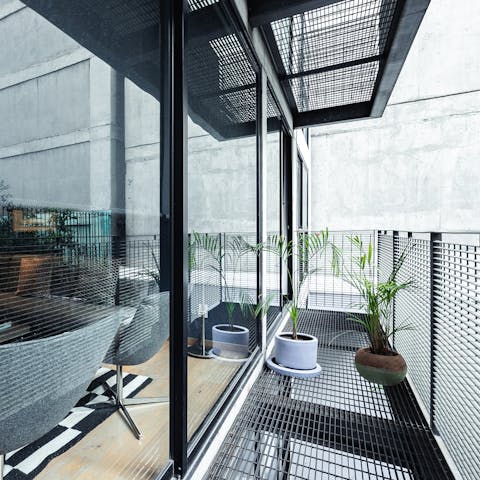 Step out onto the balcony with your morning coffee