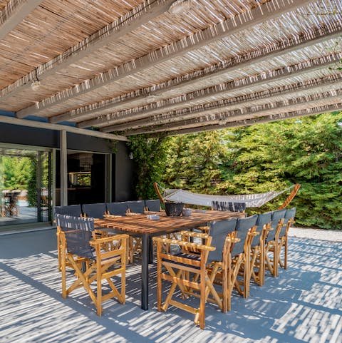 Indulge in a long lunch on the patio, dappled with sunlight through the bamboo pergola