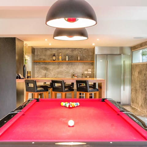 Enjoy fun evenings at home, mixing drinks at your bar area and making use of the pool table