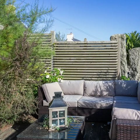 Sip on a local Muscadet in the lush garden