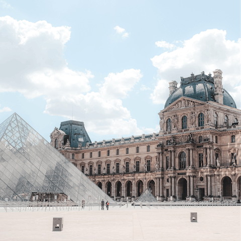 Take a seven-minute stroll through the streets of Paris to visit the iconic Louvre Museum